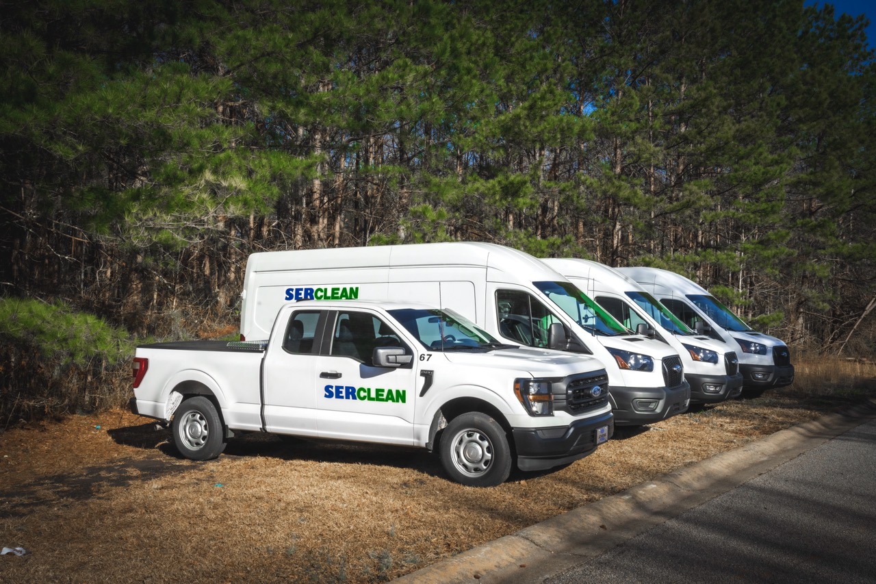 Serclean service vehicles parked outside
